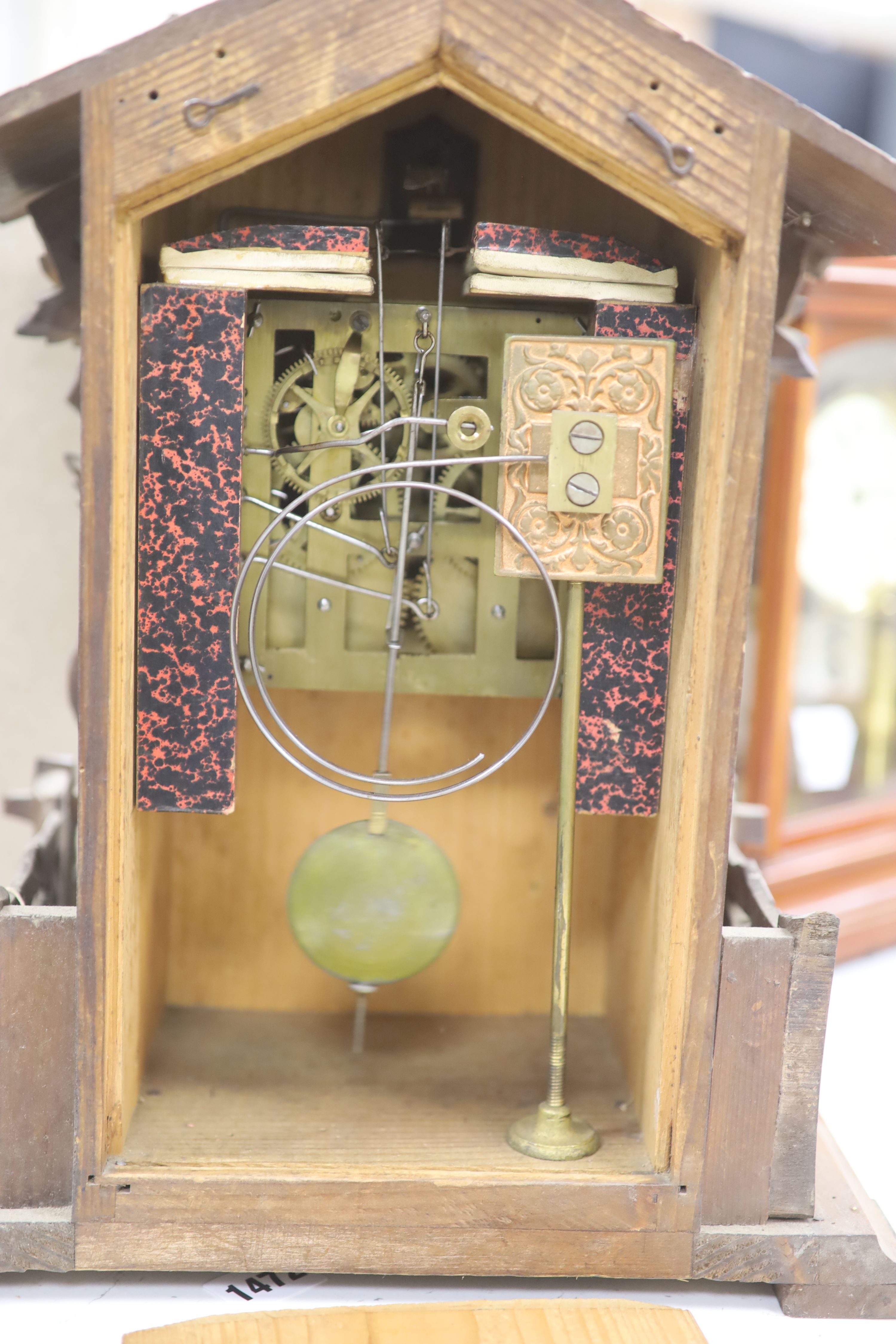 A late 19th century Black Forest cuckoo mantel clock, height 45cm